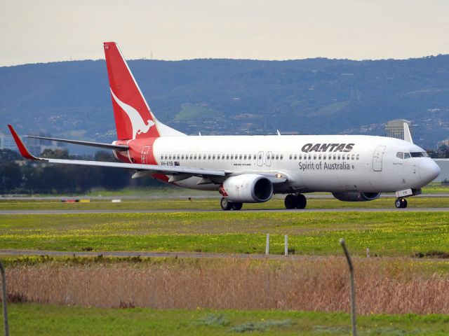 Boeing 737-800 (VH-VYB) - On taxi-way heading for take off on runway 05. Thursday, 12th July 2012.