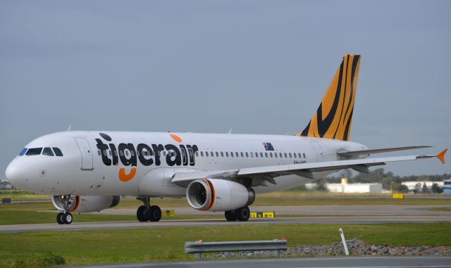 Airbus A320 (VH-VNQ) - Taxiing for a takeoff at Brisbane 25th July 2013. Shiney new aircraft.