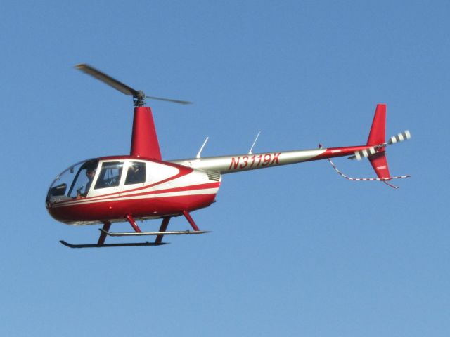Robinson R-44 (N3119K) - Lifting off from Fullerton. 