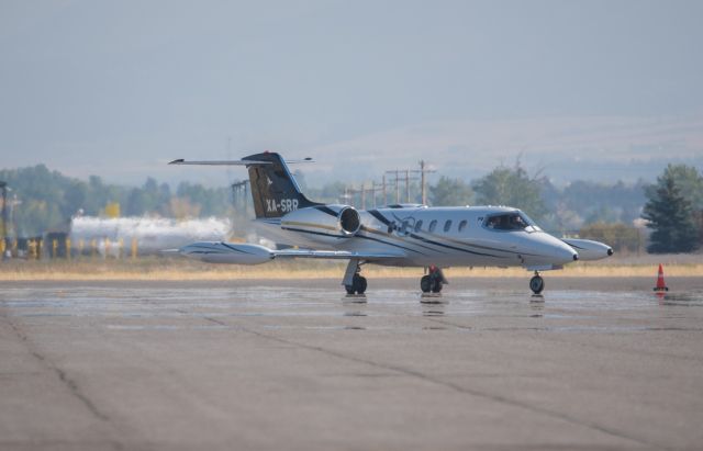 Learjet 35 (XA-SRR) - Lear 25D taxing at KBZN