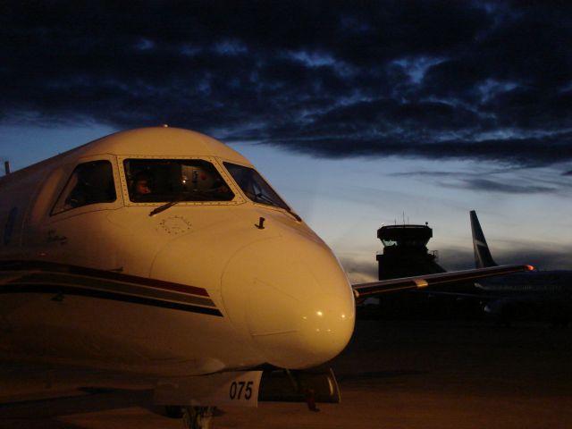 C-GXPS — - Sun sets on the Fort McMurray Airport as another busy day closes out on the Canadian Oilsands.