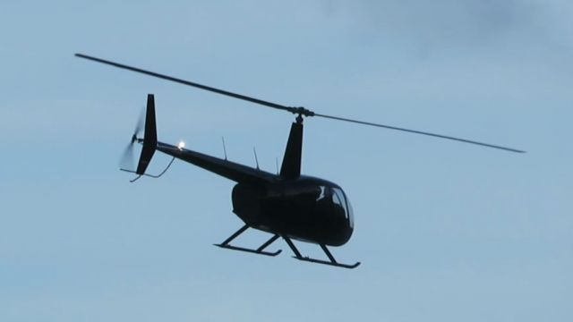 Robinson R-44 (N440TT) - This R-44 fly at 50ft at Dorado Del Mar Hotel.