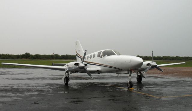 Cessna Chancellor (ZS-LTY) - At the Orapa Diamond Mine, Botswana. A rainy day - very unusual.