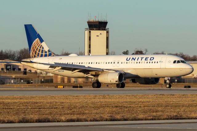 Airbus A320 (N417UA) - United 593 strolls past the Des Moines International Airport Tower on here way to Gate A2 completing an on time arrival from Denver. Photo taken December 22, 2021 at 4:11 PM with Nikon D3200 at 135mm.