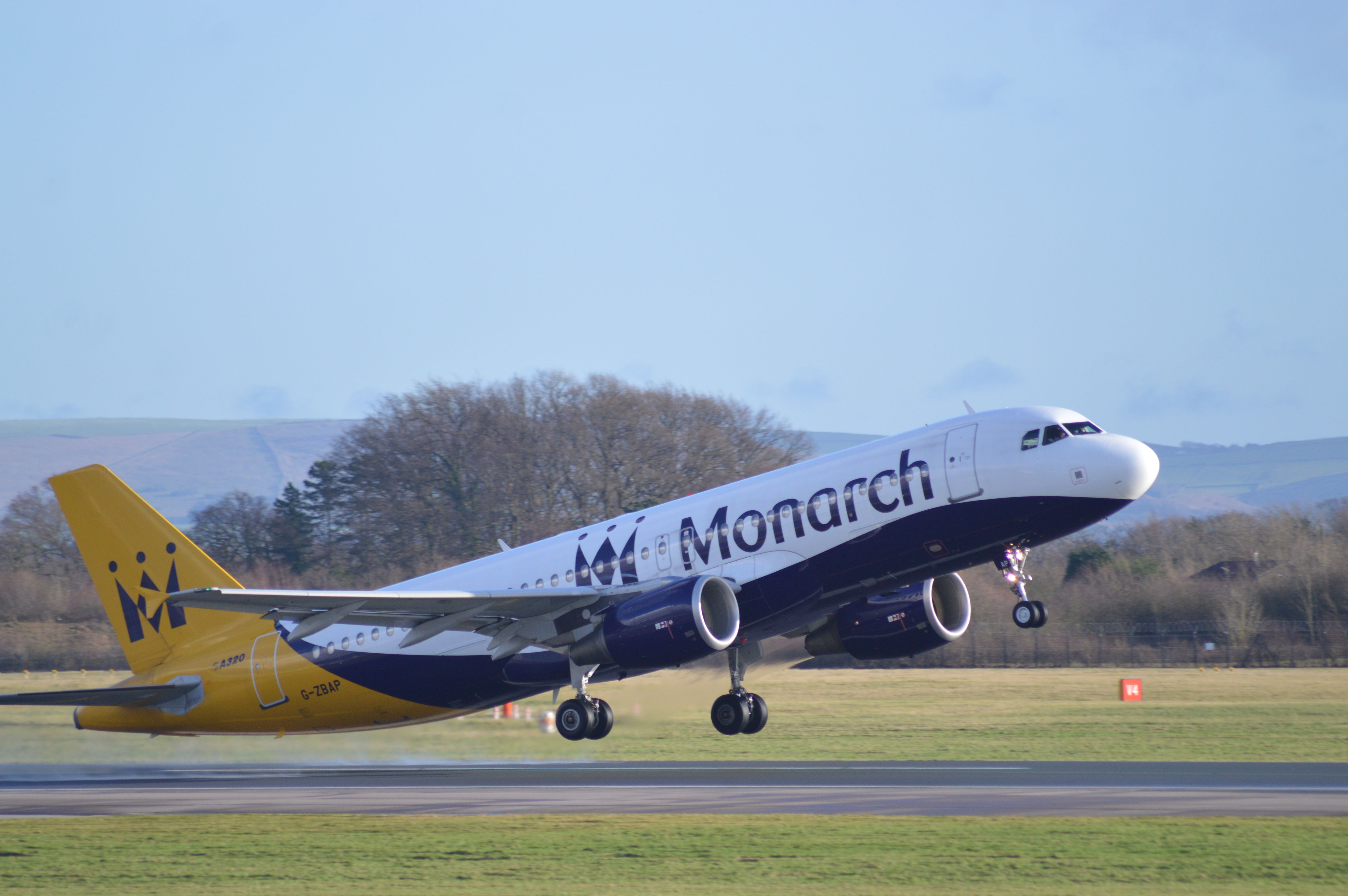 Airbus A320 (G-ZBAP) - Rotating off 23R . Shot taken from the viewing park at MAN