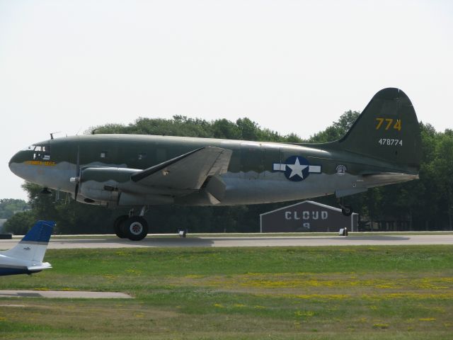 CURTISS Commando (N78774) - C-46 landing at AirVenture 2012