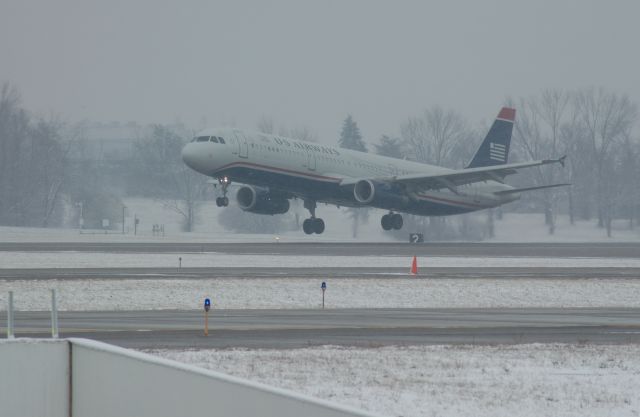 Airbus A321 (AWE9072) - first time that i have seen a A321 at CVG, landing on 36R, on Sat Dec 4th 2010 landing at 2:36pm    thank you again to a certin somebody at the airport for letting me be out the in that area, to take this great shot    Truck10FMFD@aol.com for comments