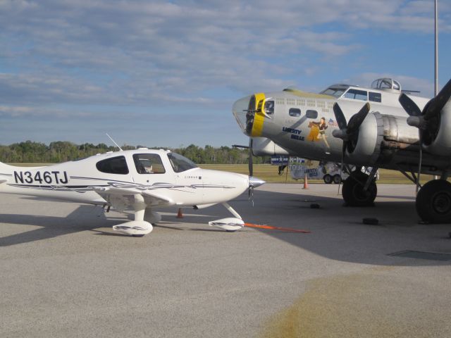 Cirrus SR-22 (N346TJ) - Cirrus SR22 going nose to nose against the "Liberty Belle" B-17 Flying Fortress.