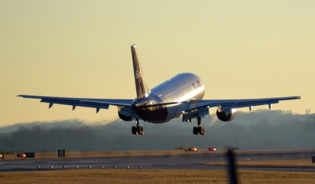 Airbus A310 (N430FE) - Late afternoon landing at McGhee Tyson airport in Alcoa, TN