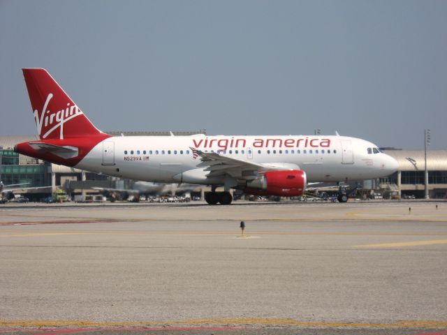 Airbus A319 (N529VA) - Holding on RWY 19R