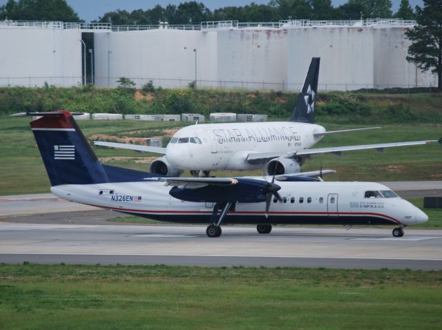 de Havilland Dash 8-300 (N326EN) - Takeoff roll 18C at KCLT - 5/21/13