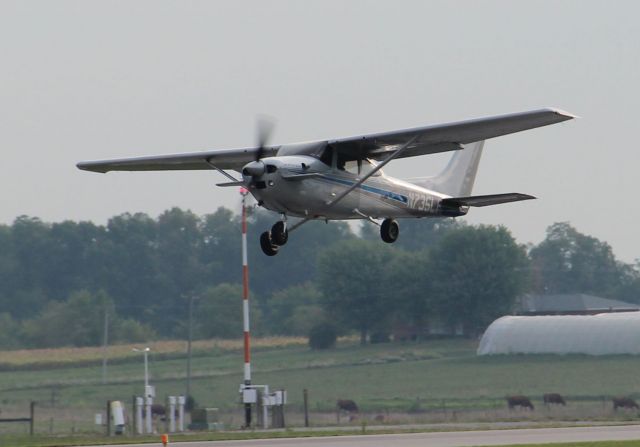 Cessna Skylane (N735LF) - Departing rwy 27 in Aug of 2012....