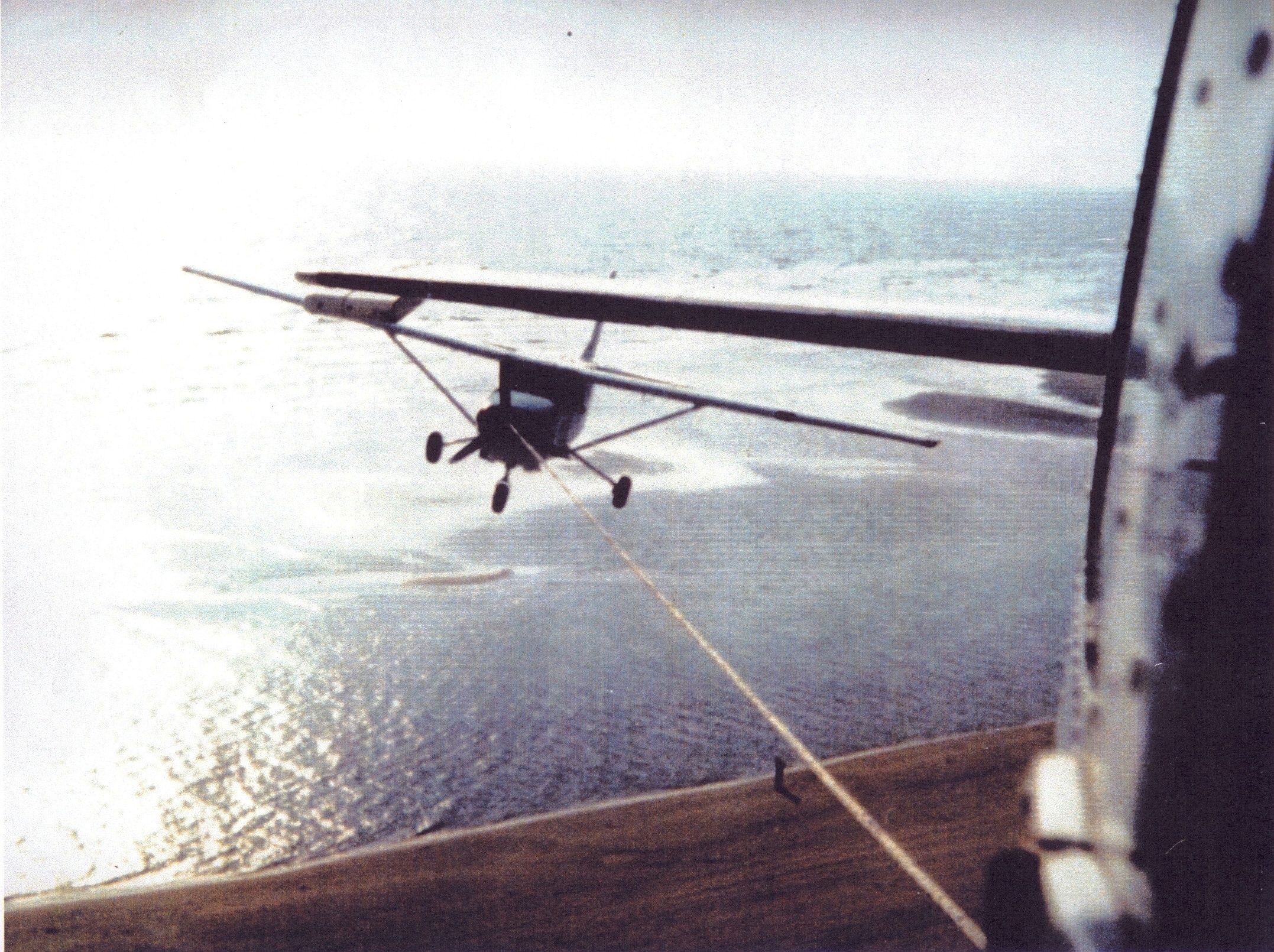 Cessna T207 Turbo Stationair 8 (C207) - Cessna 207 being towed by a Cessna 206 close to Tampico Mexico.  Not  Photoshop . This one was taken by my friend.