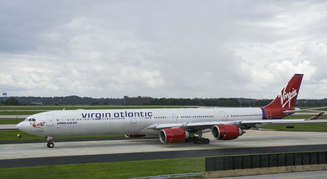 Airbus A340-600 (G-VFIT) - Taxiing after arriving 27L from Londonbr /6/18/17