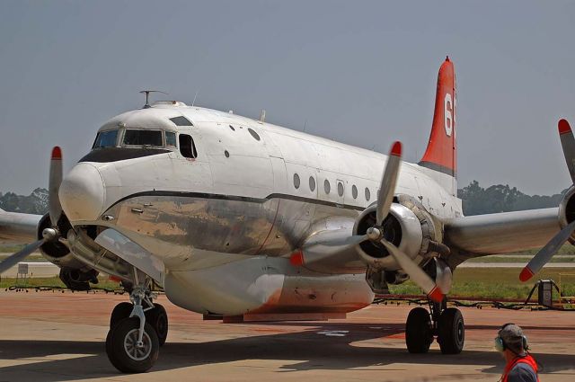 Douglas C-54 Skymaster (N8502R) - TBM Inc. Douglas C-54E Cargomaster N8502R Tanker #65 taxies onto position for refilling at the Goleta Tanker Station on May 5, 2004.