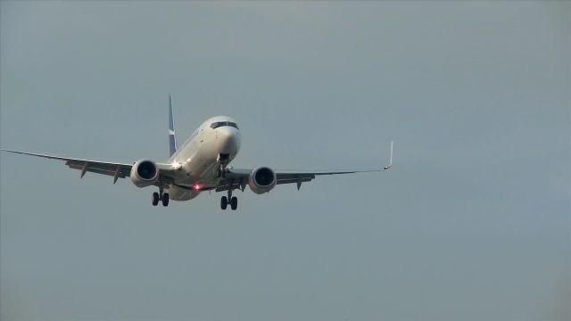 — — - Westjet Landing...