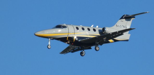 Beechcraft Premier 1 (N657NG) - Early morning short final for this 2004 Beechcraft 390 Premier 1 in the Autumn of 2022.