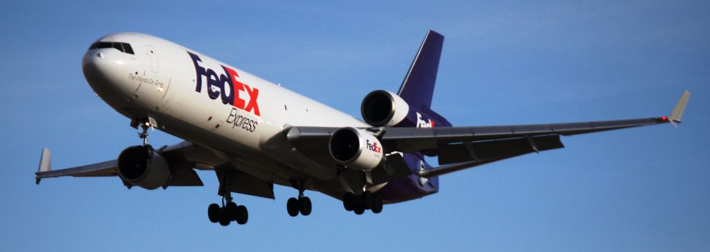 Boeing MD-11 (N523FE) - Landing on 35L.