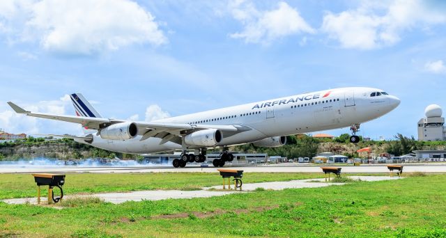 Airbus A340-200 (F-GLZJ) - Airfrance A340 landing at TNCM St Maarten.