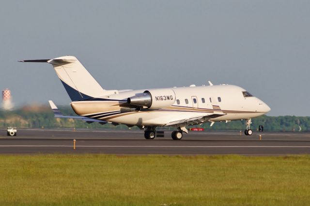 Canadair Challenger (N163WG) - 22R rotation shot @ KBOS Logan on FlightAware.Com !