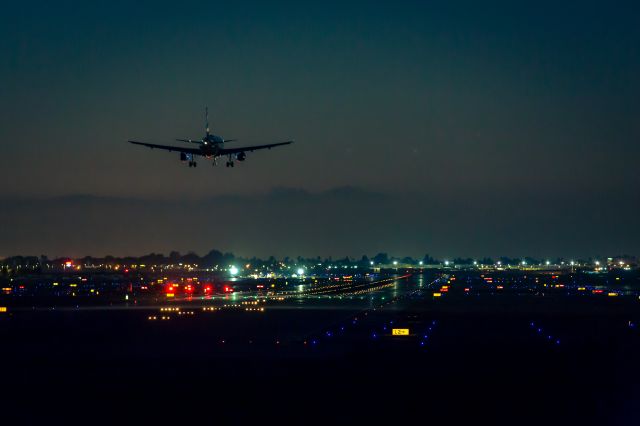 Airbus A320 — - About to touch down at KLGB