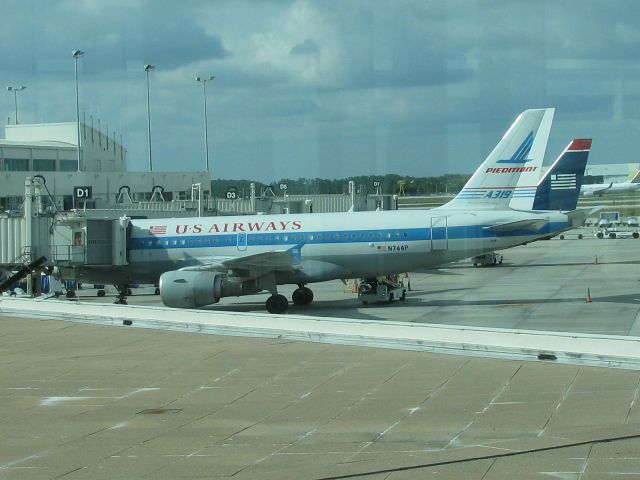 — — - N744P US Airways A319 at KRSW. 11/24/13