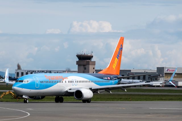 Boeing 737-800 (C-FRZG) - Photographed taxiing from the terminal on the way to a departure on runway 09 at Victoria Intl. Airport in BC, Canada.