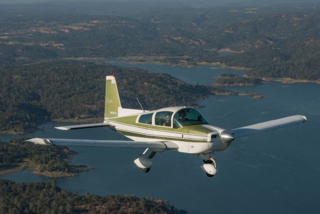 Grumman AA-5 Tiger (N4557V) - Flying over Folsom Lake, CA, trying out a new camera and lens.br /©2012 Andy Robinson