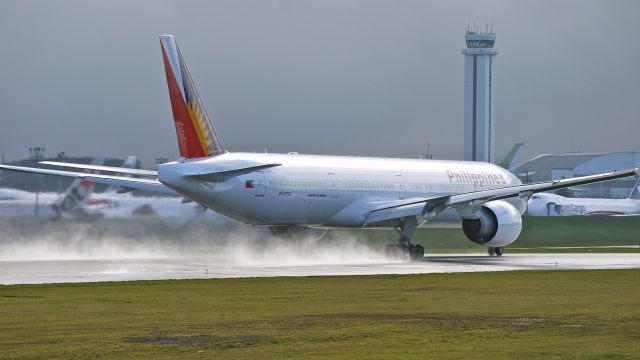 BOEING 777-300 (RP-C7772) - BOE994 during its take off roll on a wet Rwy 16R to begin its maiden flight on 11/12/13. (LN:1153 cn 38719).