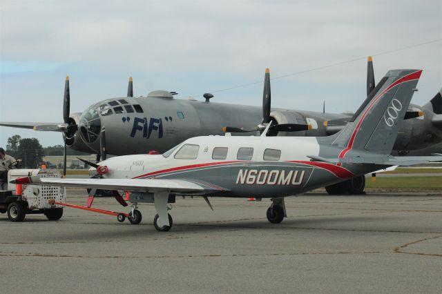 Piper Malibu Meridian (N600MU) - Piper Malibu Meridian being towed before takeoff in front of Fifi