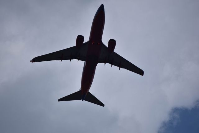 Boeing 737-700 (N406WN) - 8/26/2016: A silhouette of a Southwest Airlines Boeing 737 on final over Addison Circle Park enroute to Dallas Love Field.