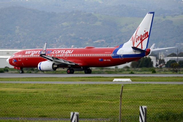 Boeing 737-800 (VH-VUL) - Rolling for take-off on runway 05. Thursday, 19 June 2014.