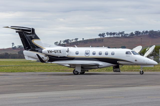 Embraer Phenom 300 (VH-UYX) - Special Mining Services, operated by Flight Options Australia, (VH-UYX) Embraer 505 Phenom 300E.