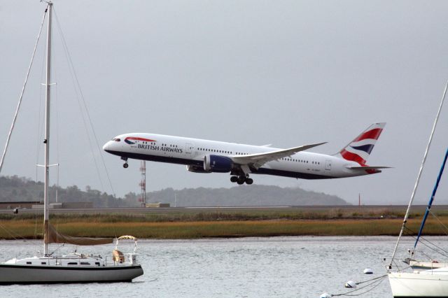 Boeing 787-9 Dreamliner (G-ZBKF) - Lift off between the boats.