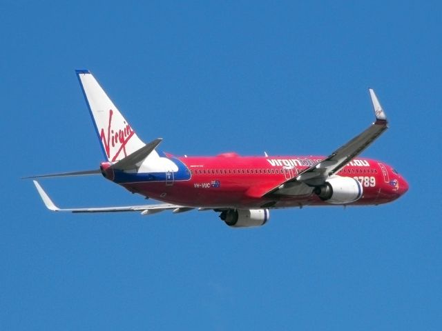 Boeing 737-700 (VH-VUC) - Getting airborne off runway 23. 18th January 2012.