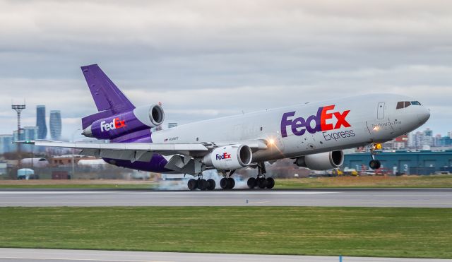 McDonnell Douglas DC-10 (N308FE) - FDX148 sets the mains down on runway 33L