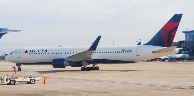 BOEING 767-300 (N181DN) - Pulling into the gate.  3/16/20.