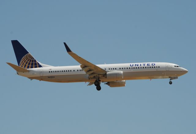 Boeing 737-900 (N69824) - Arriving from Denver on 16L. Taken on June 2nd, 2014, one month after this aircraft's first flight.