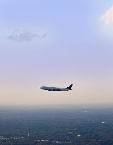 — — - A beautiful Summer evening as a Delta 767 is on approach to Atlanta Hartsfield airport. Another GREAT photo by DEMOORE.com