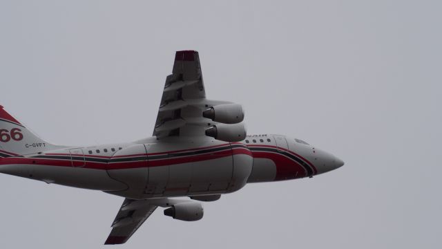 Avro Avroliner (RJ-85) (C-GVFT) - Conair Aerial Firefighting, C-GVFT, an RJ-85 Avro Avroliner, leaving the Iqaluit airport. June 25, 2017