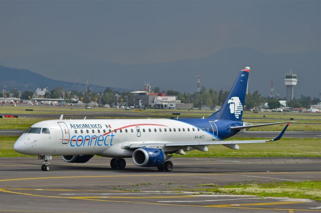 Embraer ERJ-190 (XA-ACT) - Embraer E-190LR XA-ACT MSN 557 of AeroMexico Connect taxiing to departure from Mexico City International Airport (07/2018).