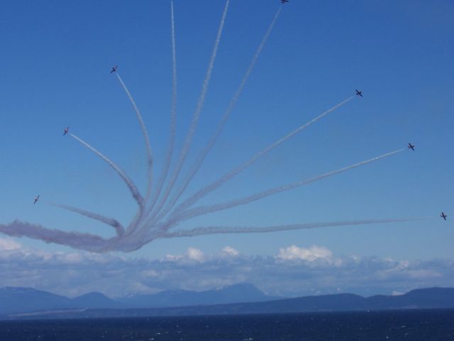 — — - "Imagination Explodes"    Canadian Snowbirds  Motto:   HATITEN RONTERIIOS   (Warriors of the air)    Fliying the tandem seated  Canadair CT-114 Tutor  CFB Comox British Columbia