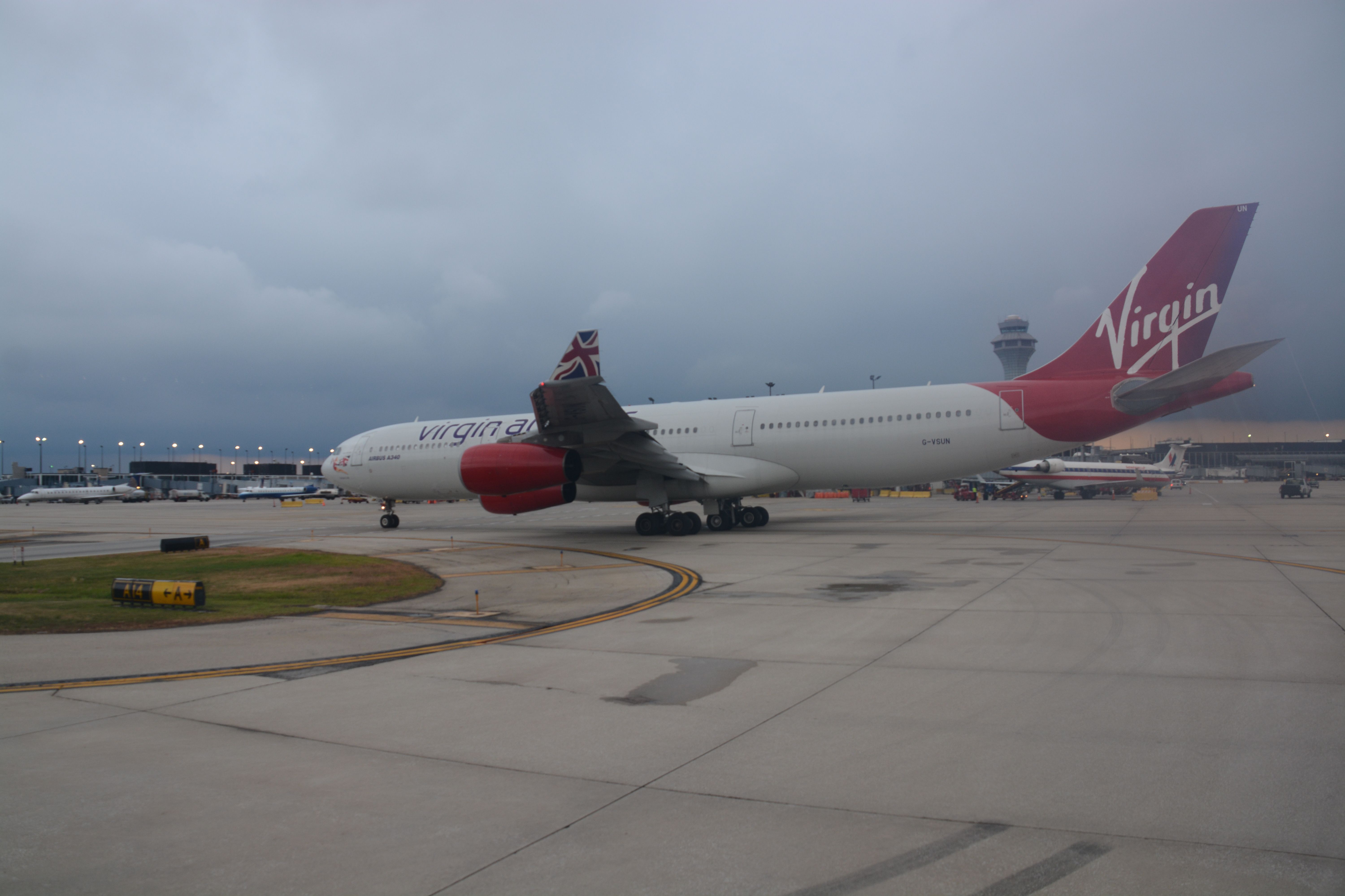 Airbus A340-300 (G-VSUN) - Window photo while taxing out on my flight to Klas.