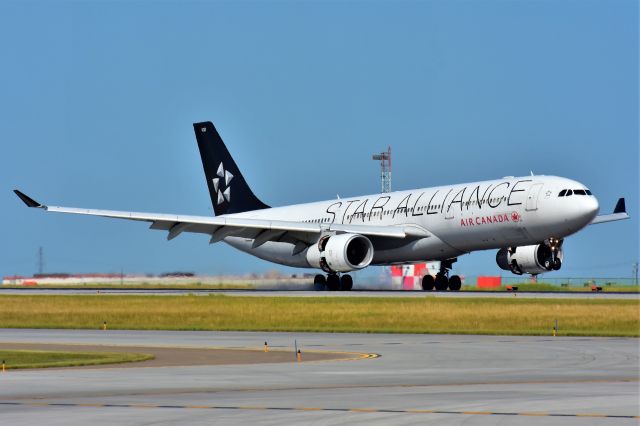 Airbus A330-300 (C-GHLM) - Air Canada Airbus A330-343(Star Alliance Livery) arriving at YYC on Aug 2.