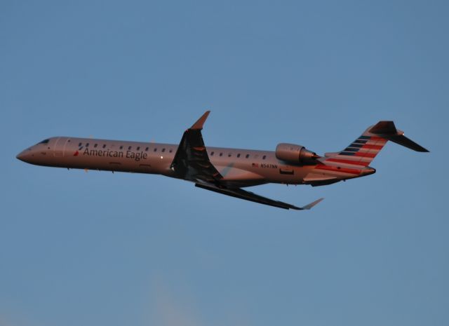 Canadair Regional Jet CRJ-900 (N547NN) - Departing runway 36C at dusk - 11/1/14