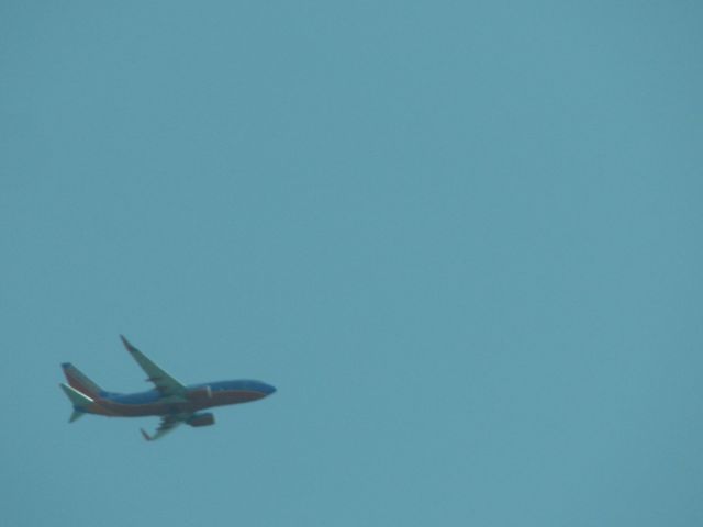 Boeing 737-700 (N7723E) - Southwest flight 10 departing Dallas for Oakland, CA