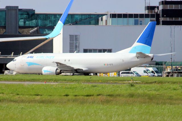 BOEING 737-400 (EI-STS) - Parked on the cargo ramp on 30-Mar-23 after operating EAT Leipzig flight BCS2938 from EGNX.