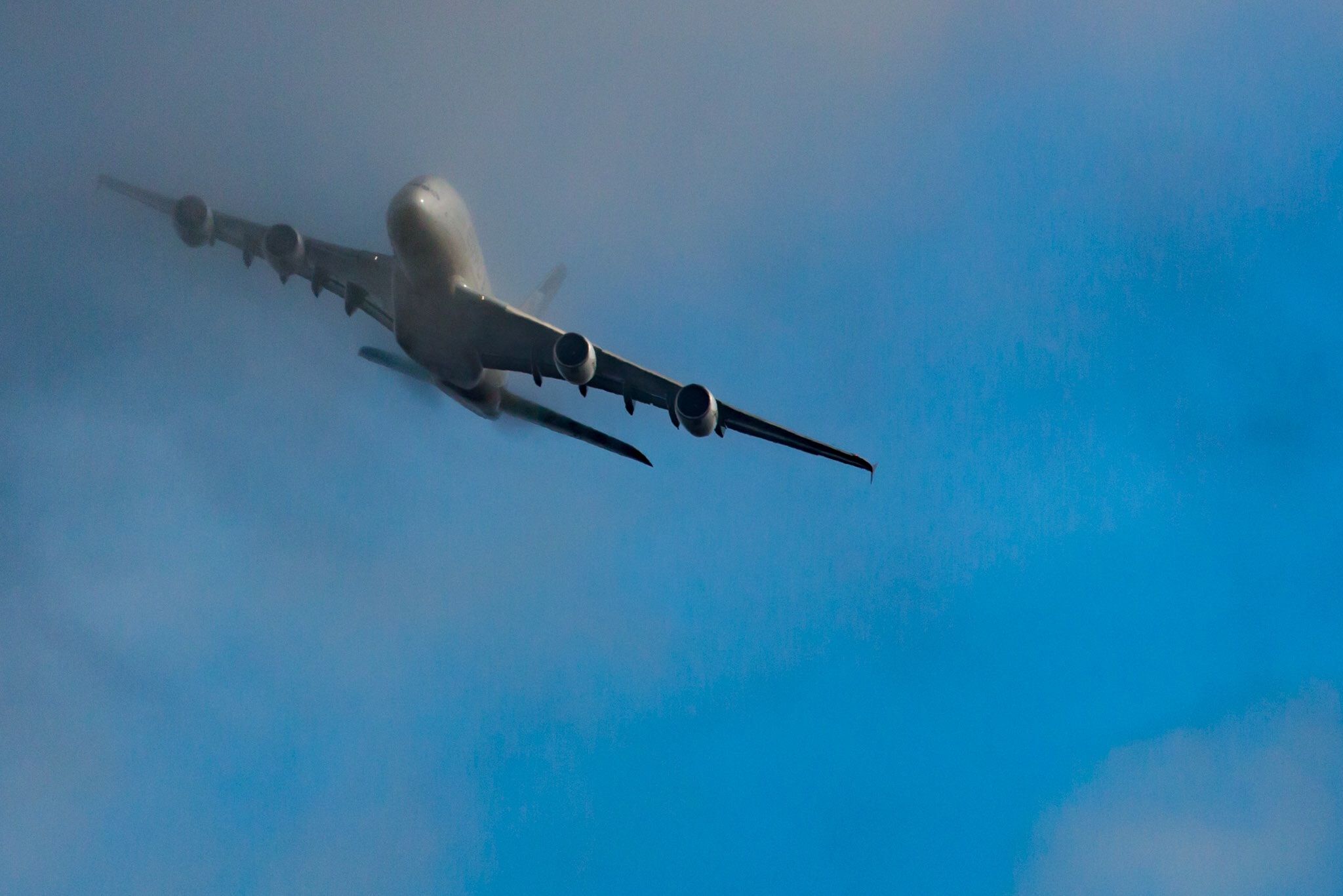 Airbus A380-800 (A6-APB) - Coming through low cloud cover, Turning to align to JFK 22R, over Long Island, new A380 service