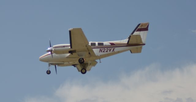 Beechcraft Baron (58) (N22VX) - Final Approach to Runway 21 KFSD - 5-1-12