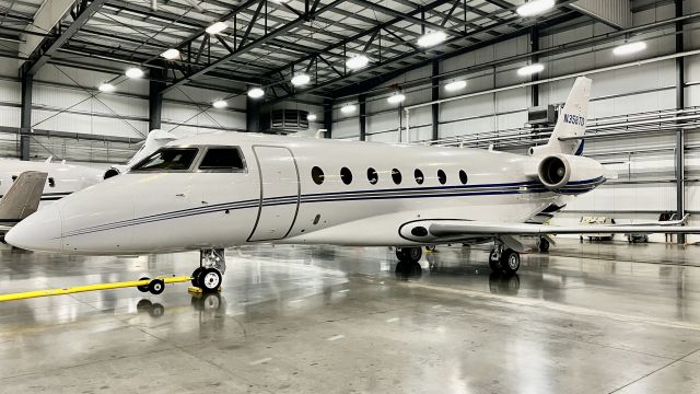 IAI Gulfstream G200 (N358TD) - One of Gary/Chi’s many tenants, this one a G200, in Gary Jet Center’s main hangar. br /br /This aircraft is a IAI Gulfstream G200, SN 170, owned/operated privately. 12/13/22. 